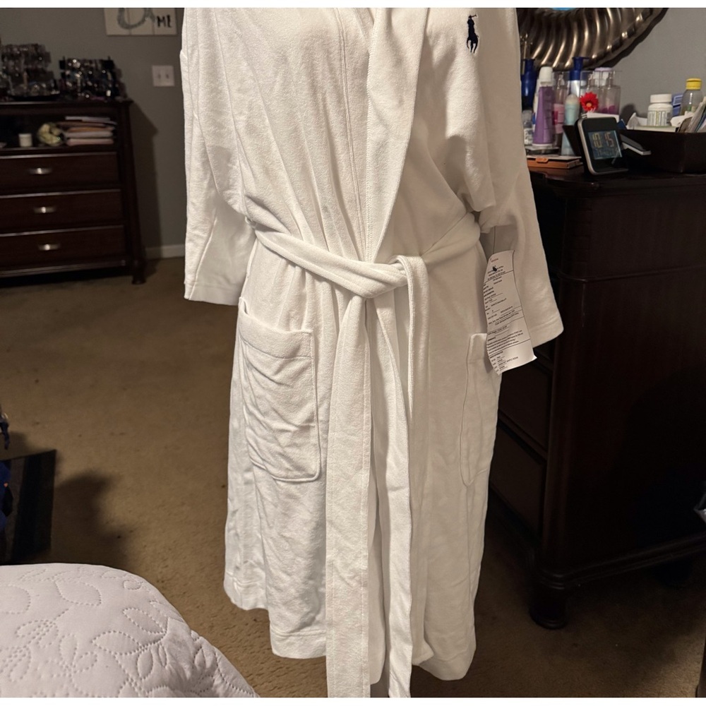 1 Medium White Polo Robe with Navy Blue Emblem. Robe has a hood and two pockets.
